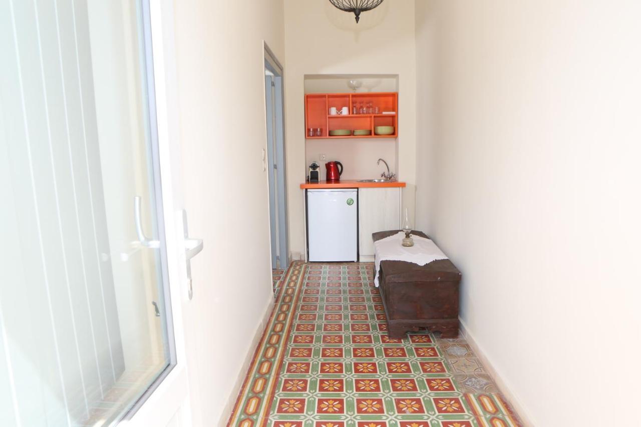 Nomikos Mansion Apartment คาร์เทราดอส ภายนอก รูปภาพ