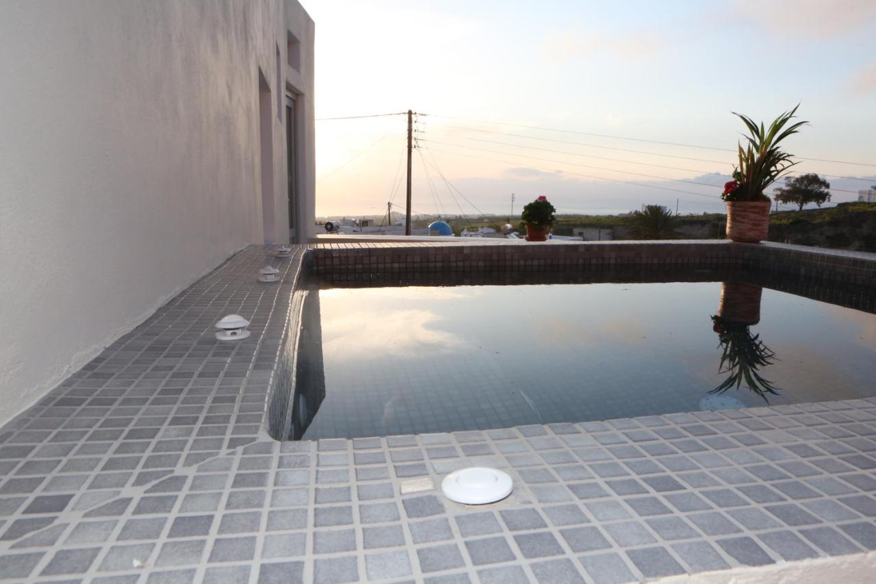 Nomikos Mansion Apartment คาร์เทราดอส ภายนอก รูปภาพ